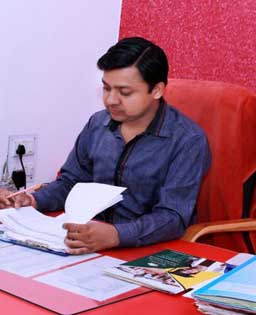 Dr. Rajender Godara